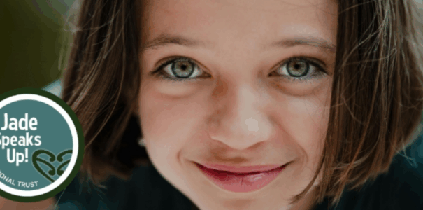 a young girl smiling with the jade speaks up logo
